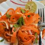 Spicy carrot ribbon salad with honey sesame dressing