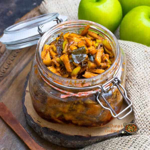 green apple pickle kerala style in a glass jar