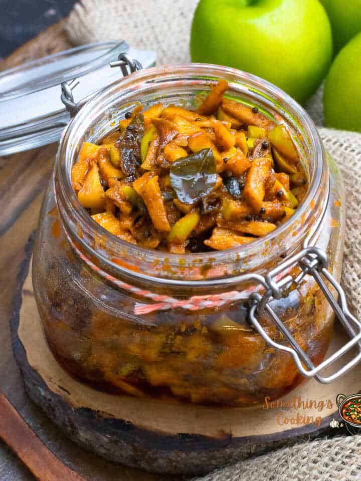 green apple pickle kerala style in a glass jar